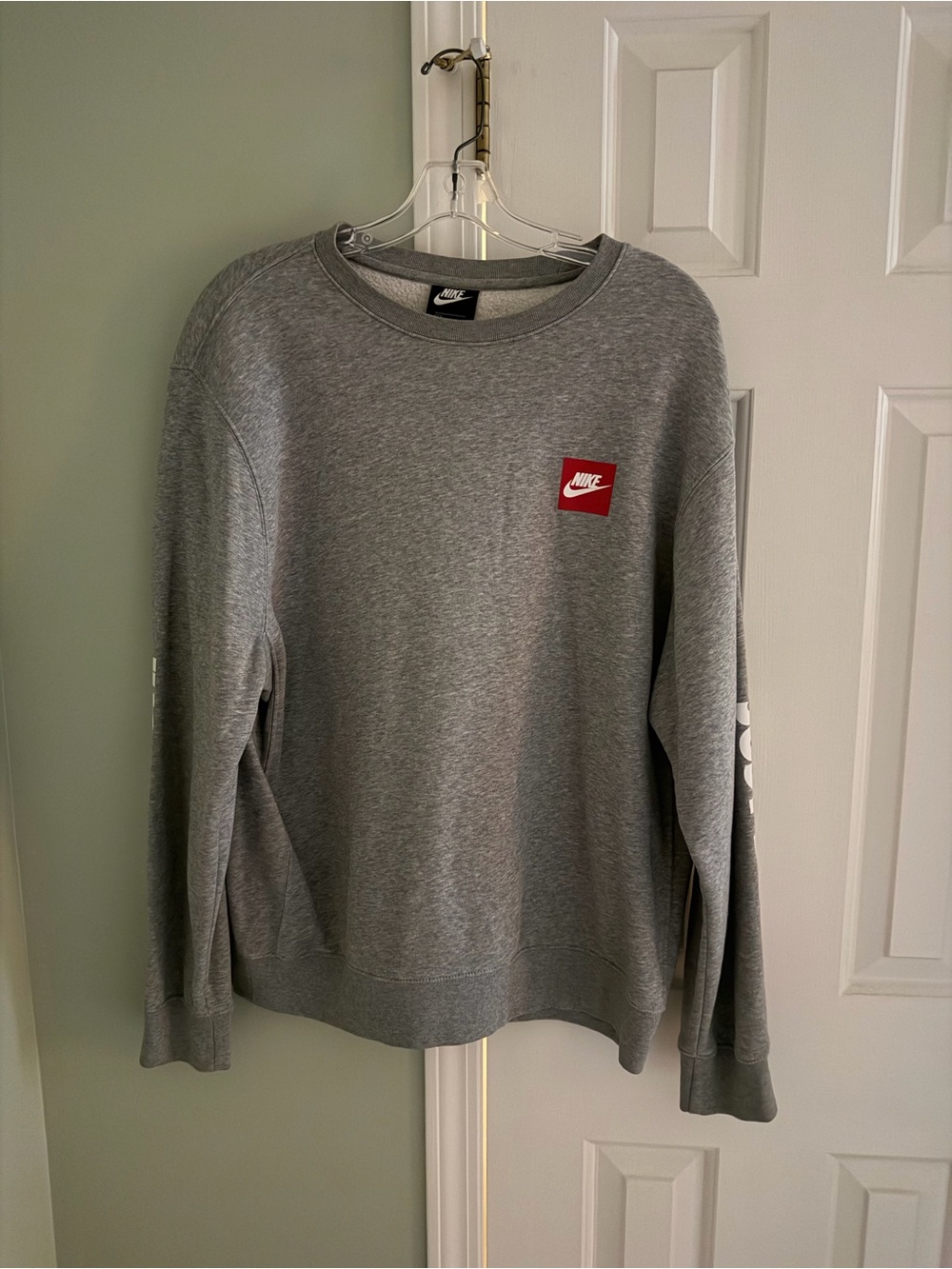 Nike Grey Crewneck Sweatshirt with Red Logo Patch